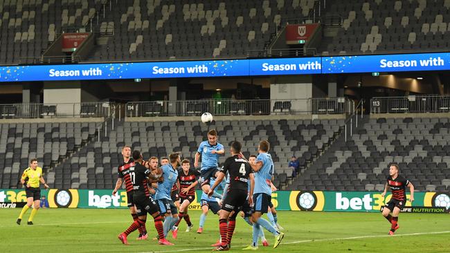Sydney FC and the Wanderers play in front of empty stands before the A-League was shut down