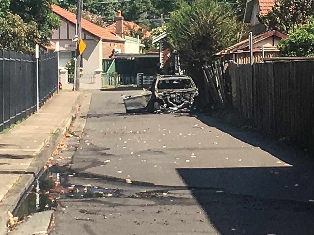 The burned out car believed to be involved in the Rockdale Fitness First shooting where former bikie boss Mick Hawi was shot. Picture: Nick Hansen