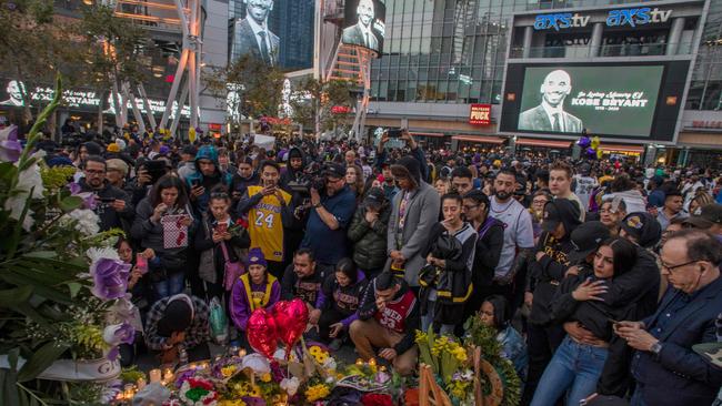 Lakers fans gather at a makeshift tribute for Bryant.