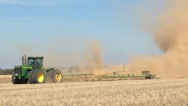 Dusty start: Dry sowing comes with its dusty hazards as vetch is planted on this paddock near Lalbert. Picture: Brenton Cunning.