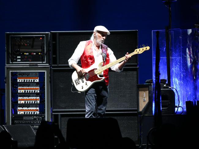 Fleetwood Mac performing in Sydney, Lindsey Buckingham - lead guitar, rhythm guitar, vocals, Stevie Nicks - vocals, tambourine, Christine McVie - vocals, keyboards, maracas, accordion on 