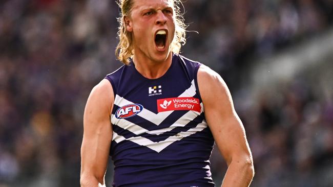 PERTH, AUSTRALIA - JUNE 23: Hayden Young of the Dockers celebrates a goal during the 2024 AFL Round 15 match between the Fremantle Dockers and the Gold Coast SUNS at Optus Stadium on June 23, 2024 in Perth, Australia. (Photo by Daniel Carson/AFL Photos via Getty Images)