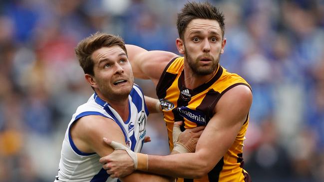 Brad McKenzie competes for the ball with Hawthorn’s Jack Gunston in 2016, which would prove to be his last season at the Kangaroos. Picture: Michael Willson/AFL Media/Getty Images