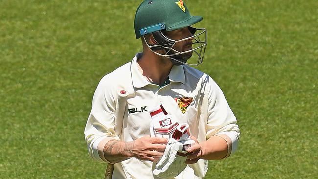 Matthew Wade trudges off the MCG after being bowled by Peter Siddle on day one of the Sheffield Shield clash between Victoria and Tasmania. Picture: Getty Images