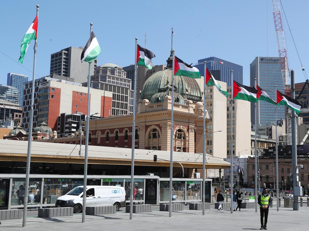 Several Palestine flags were observed flying over Federation Square on Friday. Picture: David Crosling