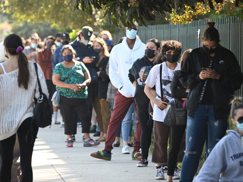 People wait in long lines for coronavirus tests at a walk-up COVID-19 testing site ahead of Thanksgiving. Picture: Robyn Beck/AFP