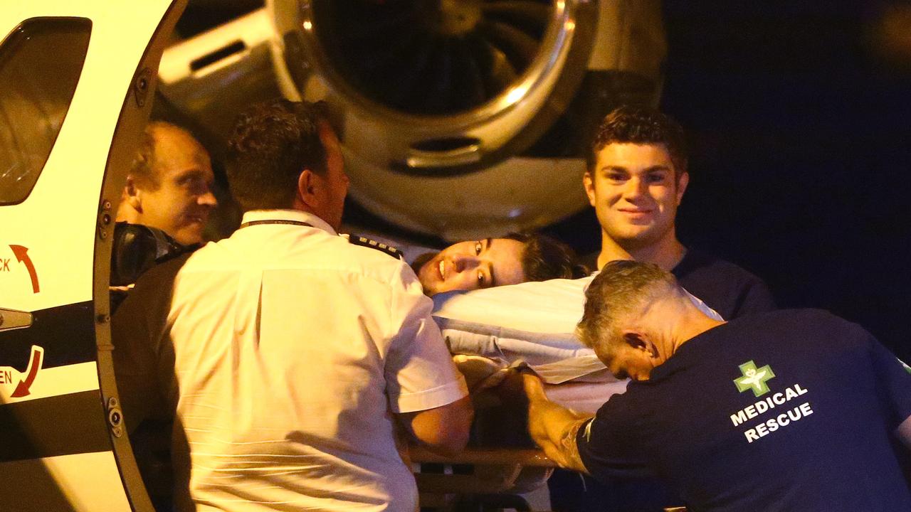 Alex Shorey arrives back in Australia on a Medical extraction flight from Taipei after suffering a possible rat poisoning. Picture: David Clark