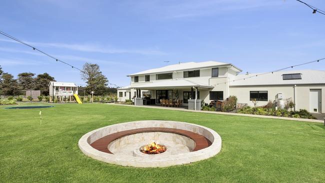 The firepit has lights and is capable of holding up to 20 people.