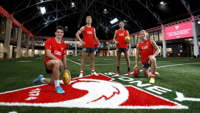 Errol Gulden, Callum Mills, Will Hayward and Isaac Heeney in the new Sydney Swans HQ at the Royal Hall of Industries. Picture: Phil Hillyard