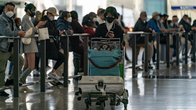 A traveller at Hong Kong International Airport over the weekend. Picture: Getty Images