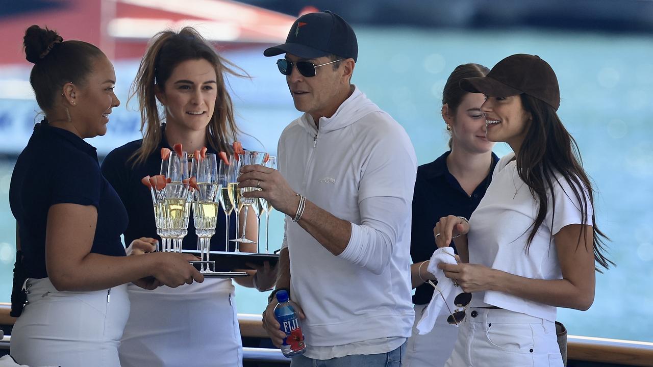 They were greeted by servers offering a refreshing glass of champagne. Picture: ©MEDIA-MODE.COM