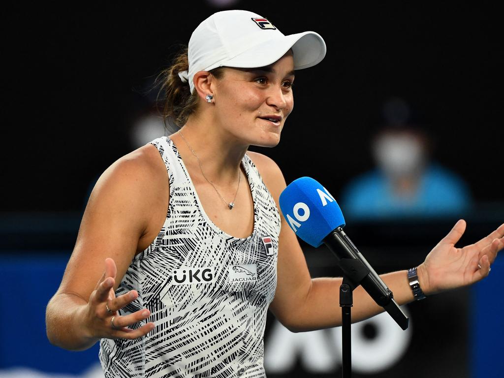 Australia's Ashleigh Barty speaks after her victory against Amanda Anisimova of the US during their women's singles match on day seven of the Australian Open tennis tournament in Melbourne on January 23, 2022. (Photo by William WEST / AFP) / -- IMAGE RESTRICTED TO EDITORIAL USE - STRICTLY NO COMMERCIAL USE --