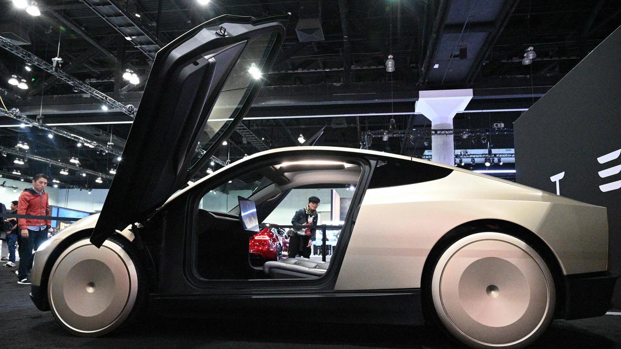 Tesla's Cybercab robotaxi is displayed during the AutoMobility LA 2024 auto show at the Los Angeles Convention Center in Los Angeles, November 21, 2024. (Photo by Robyn Beck / AFP)