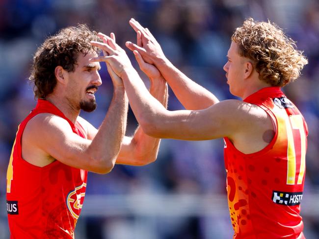 BALLARAT, AUSTRALIA - MARCH 24: Ben King of the Suns celebrates a goal with teammate Jed Walter during the 2024 AFL Round 02 match between the Western Bulldogs and the Gold Coast SUNS at Mars Stadium on March 24, 2024 in Ballarat, Australia. (Photo by Dylan Burns/AFL Photos via Getty Images)