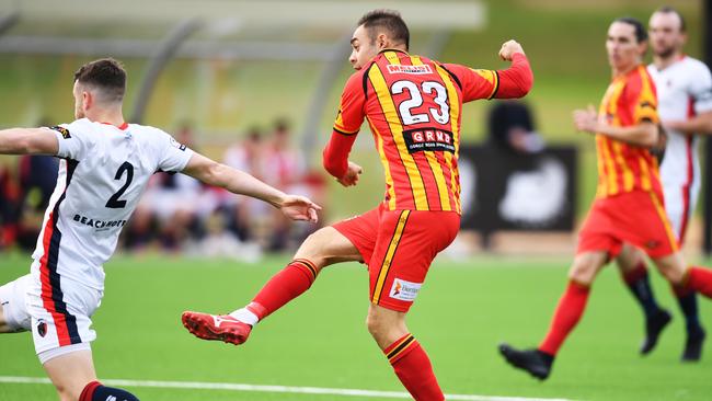 MetroStars’ Christian Esposito has a shot at goal during the clash with South Adelaide at T.K Shutter Reserve on Saturday. Picture: AAP/Mark Brake