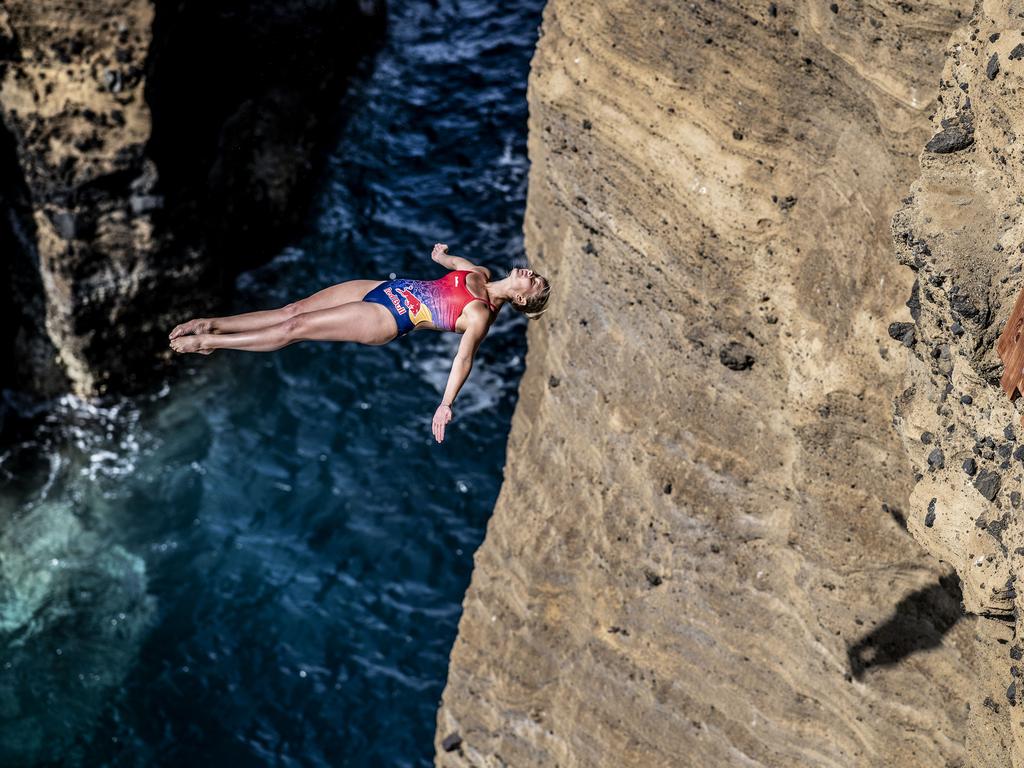 Rhiannan Iffland of Australia dives from a 21 metre cliff face on Islet Vila Franco do Campo during the first competition day of the third stop of the Red Bull Cliff Diving World Series on July 13, 2018 at Sao Miguel, Azores, Portugal. (Photo by Dean Treml/Red Bull via Getty Images)