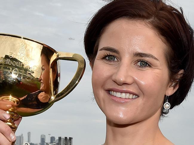 Melbourne Cup Day. Michelle Payne with the Melbourne Cup at the end of the day. Picture: Jay Town. Tuesday November 3, 2015. Melbourne, Australia. MelbourneCup15