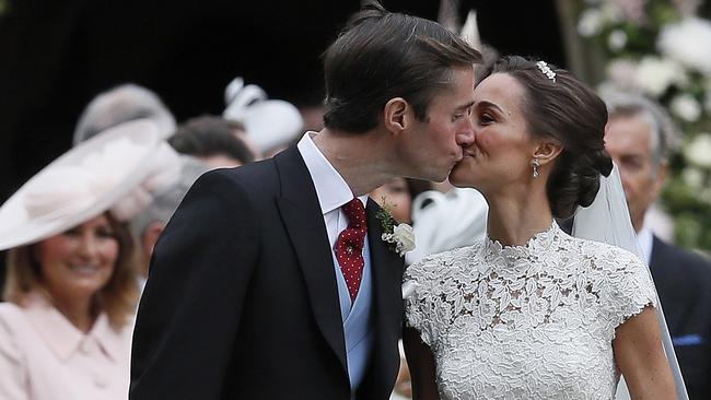 Pippa Middleton and James Matthews kiss after their wedding at St Mark's Church in Englefield. Picture: AP