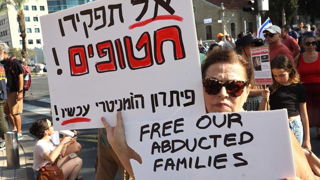 Supporters and family members of Israeli hostages, taken by the Palestinian militant group Hamas last week in a surprise attack into Israel, protest outside of the Israeli military base of HaKirya in central Tel Aviv on October 14, 2023. Picture: AFP