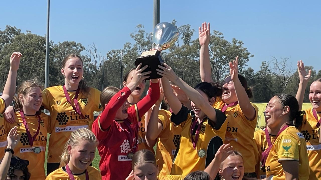 Corinda SHS celebrate a senior girls SPL premiership.