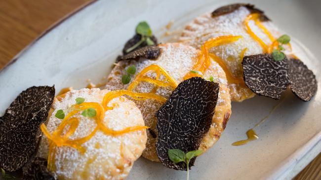 <b>B</b>                        <b><b>a</b>lla, The Star </b>Sweet ravioli filled with ricotta, orange peel and truffle honey.