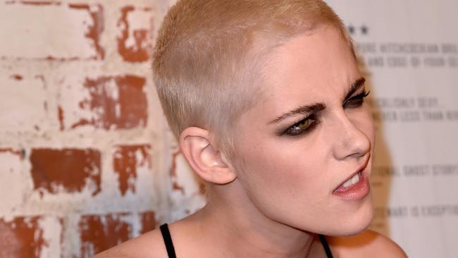Kristen Stewart shocks with a freshly shaved head at the Personal Shopper premiere.