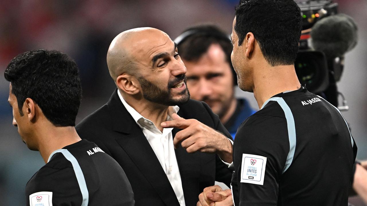 Morocco's coach Walid Regragui reacts to the referees. Photo by Paul ELLIS / AFP.