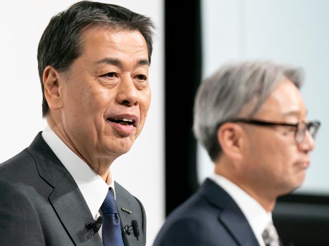 TOKYO, JAPAN - DECEMBER 23: Nissan Motor CEO Makoto Uchida (L) speaks as Honda Motor CEO Toshihiro Mibe (R) listens during a joint press conference on December 23, 2024, in Tokyo, Japan. Nissan and Honda announced they have begun merger negotiations, aiming to create the world's third-largest automotive group to compete with rival EV manufacturers such as China's BYD and the US-based Tesla.   (Photo by Tomohiro Ohsumi/Getty Images)