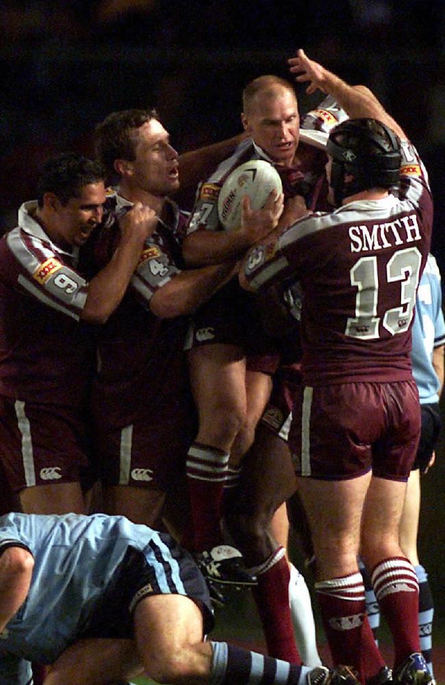 Maroons lift Allan Langer during the 2001 State of Origin Series.