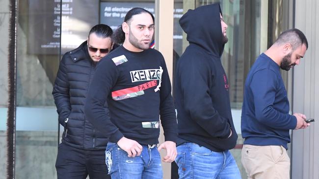 Richad Alameddine (front, facing camera) bragged about earning more money in a week than three policemen combined in a year, despite officially being “unemployed” and “living with his parents”. Picture: AAP