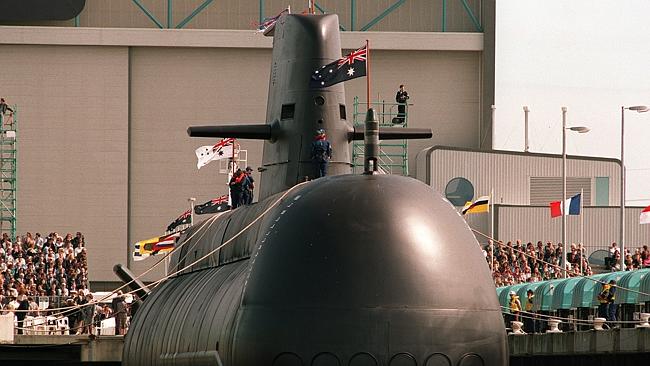 (FILES) A file photo dated August 28,1993, an Australian Collins class conventional powered submarine being lowered into the ...