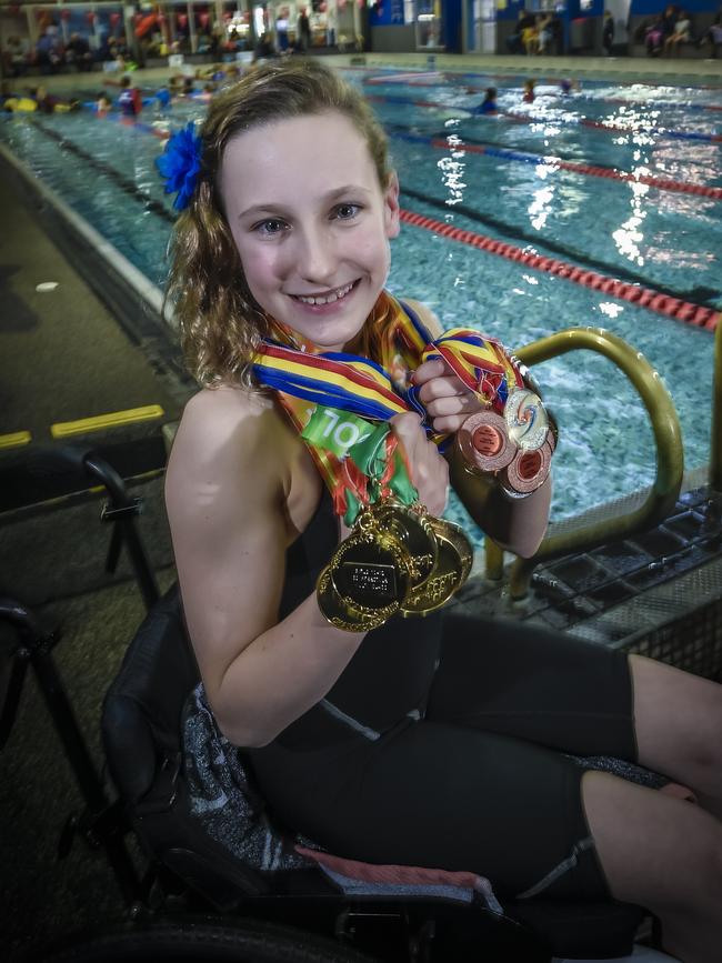 Norwood swimmer Izzy Vincent, picturedtwo years ago, after returning from the School Sport Australia Swimming Championships. Izzy will swim in the 2020 Senior SA Short Course Swimming Championships which will be live streamed this weekend by <i>The Advertiser</i>. Picture: Roy VanDervegt