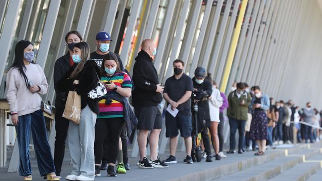 Melburnians queue to get vaccinated at the Melbourne Exhibition Centre. Picture: NCA NewsWire / David Crosling