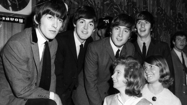 George Harrison, Paul McCartney, John Lennon, Ringo Starr at the Beatles press conference in Brisbane Savoy Hotel before the Festival Hall concert in 1964.