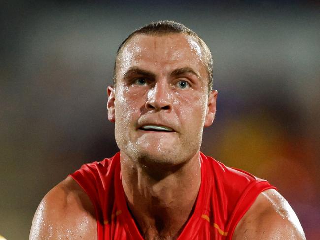 DARWIN, AUSTRALIA - MAY 11: Jarrod Witts of the Suns handpasses the ball during the 2024 AFL Round 09 match between the Gold Coast SUNS and North Melbourne Kangaroos at TIO Stadium on May 11, 2024 in Darwin, Australia. (Photo by Dylan Burns/AFL Photos via Getty Images)