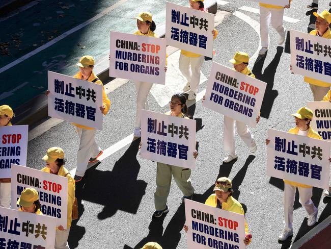 Anti-Chinese Communist Party protesters walk Castlereagh Street in Sydney’s CBD. Picture: NCA NewsWire / Damian Shaw