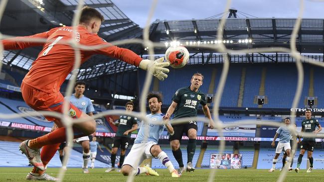 City’s David Silva scores his team’s fourth goal against Burnley at Etihad Stadium