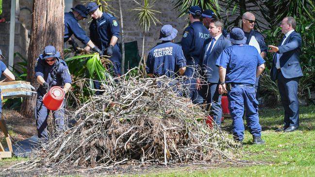 NSW Police search the front garden of William Tyrrell’s foster grandmother’s house in Kendall on Tuesday. Picture: AAP Image