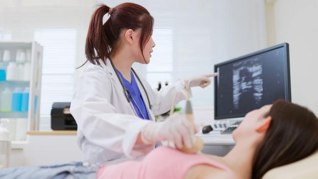 Example of ultrasound scanner being used, to performing examination of breast cancer. File photo. iStock.