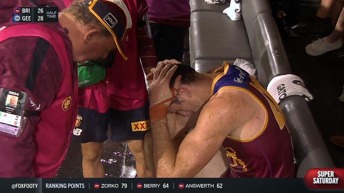 Oscar McInerney is assessed for a head injury.