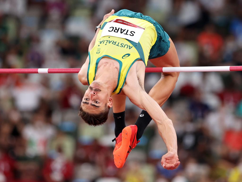 Australian Brandon Starc bends his body as he clears a jump in the men's high jump final. Picture: Cameron Spencer/Getty Images