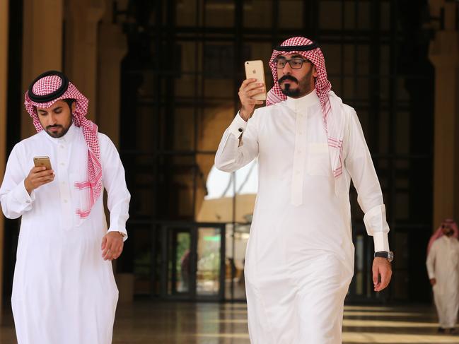 Saudi men play with the Pokemon Go application on his mobile in the capital Riyadh. Picture: AFP