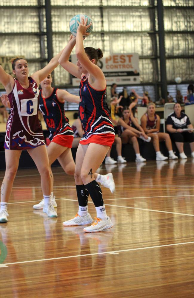 Netball action from QISSN 2024 in Townsville. Carmel College v Shalom College