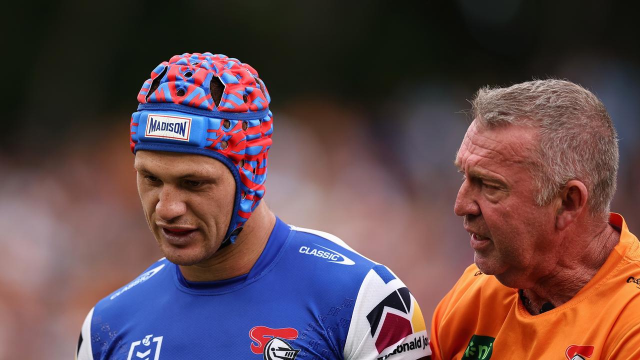 Kalyn Ponga is taken from the field at Leichhardt Oval. Picture: Cameron Spencer/Getty