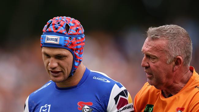 Kalyn Ponga is taken from the field at Leichhardt Oval. Picture: Cameron Spencer/Getty