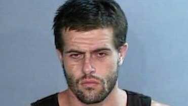 A mug shot of Coffs Harbour man Reiley Jay Amos published on social media by NSW Police Force in 2019.