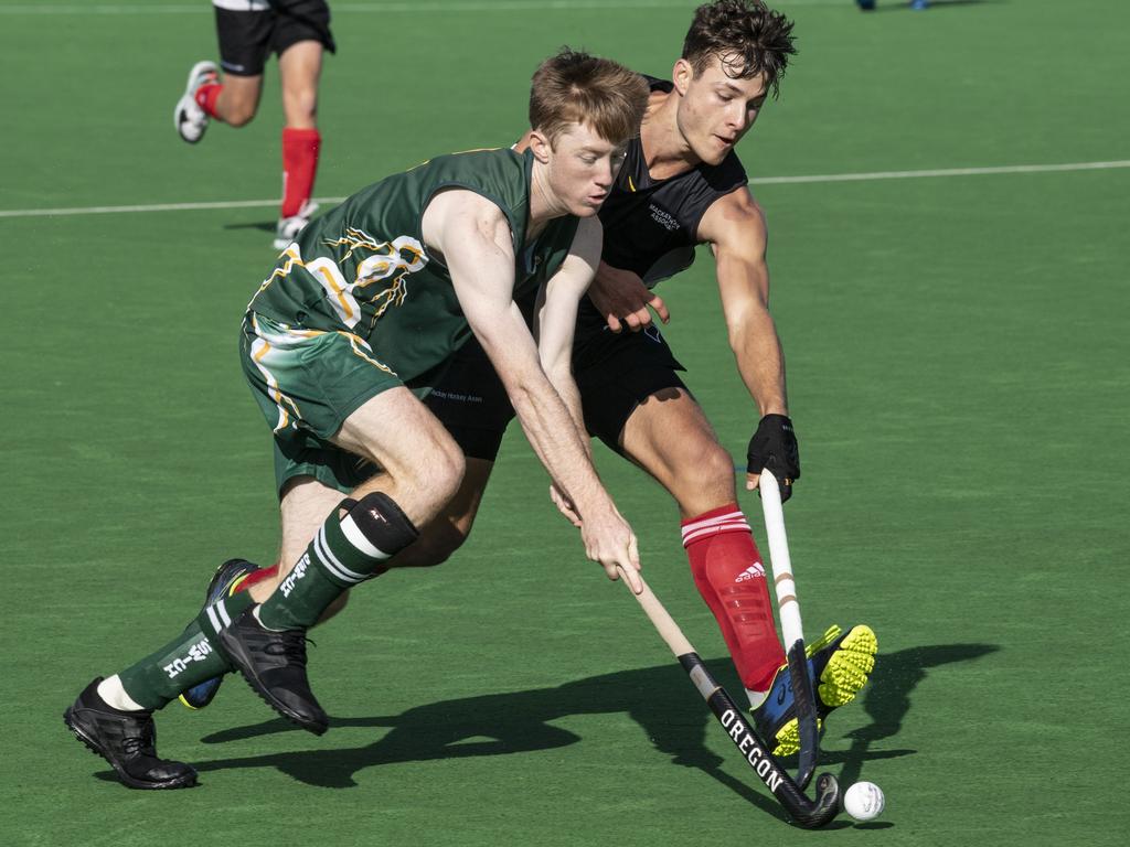 Trent Goldenstein, Ipswich and Joshua Baxter, Mackay. Ipswich vs Mackay. Hockey Queensland Championship. Saturday, May 1, 2021. Picture: Nev Madsen.