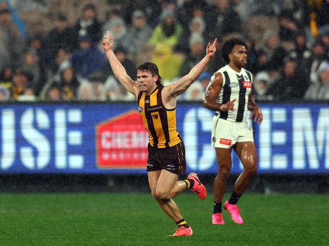 Nick Watson wheels off in celebration after a goal in the wet. Picture: Graham Denholm/AFL Photos/via Getty Images