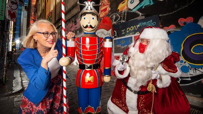 Melbourne Christmas Festival 2020 Program Launch at Hosier Lane, Melbourne. Lord Mayor Sally Capp catches up with Santa during the launch. Picture: Tony Gough