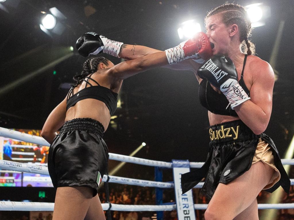 Footy WAG and boxer Ashleigh Sims (right) in a brutal four-round war against Shanell Dargan at the Hordern Pavilion on Wednesday night.